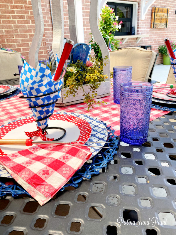 red, blue and bbq placesetting,with blue glass