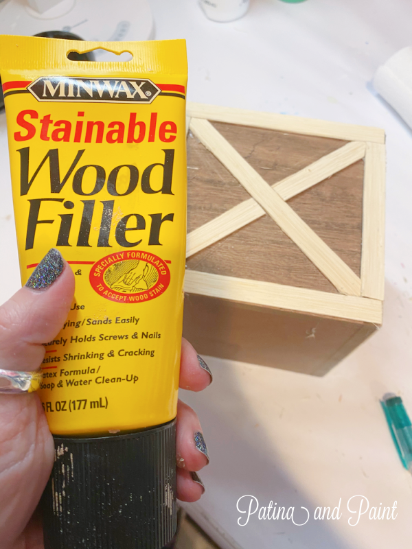 adding wood filler to a box