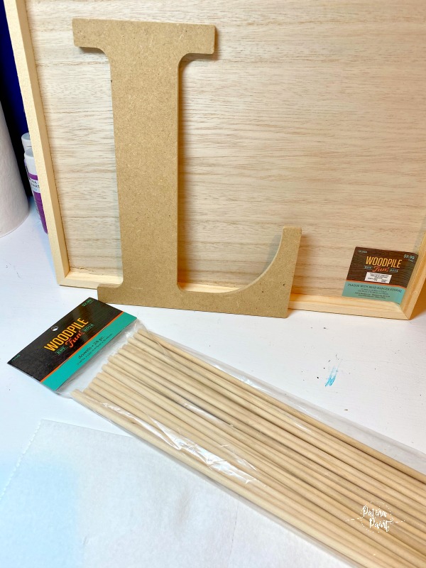 wooden letter, dowel rods
